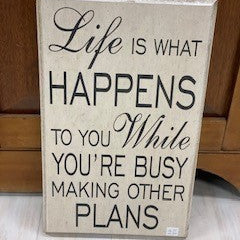 LIFE IS WHAT HAPPENS TO YOU..... SIGN